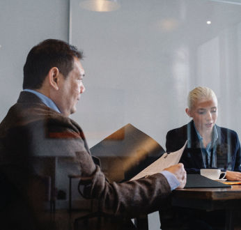 a group of people in a meeting