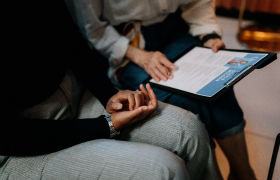 a group of people in a meeting